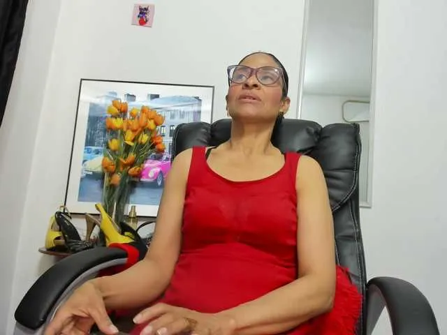 Curious Aries-Mature getting naked and peaking with her favored toys Aries-Mature from BongaCams